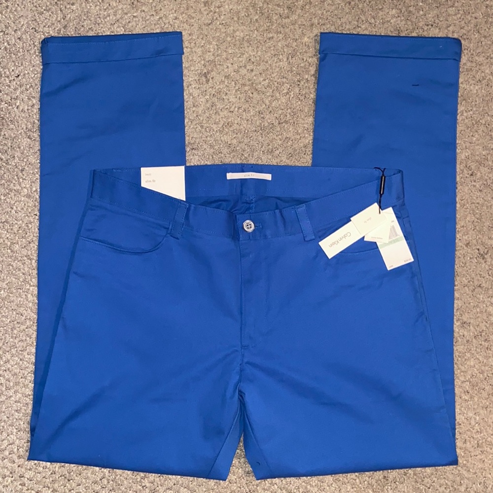 Brand new Blue Calvin Klein slim fit pants 34x32